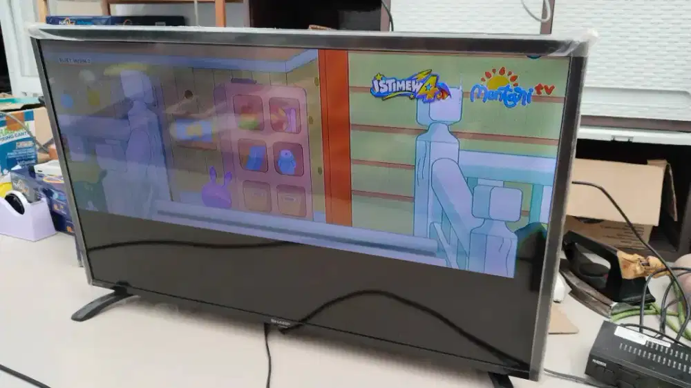 Sharp 32 inch layar separuh