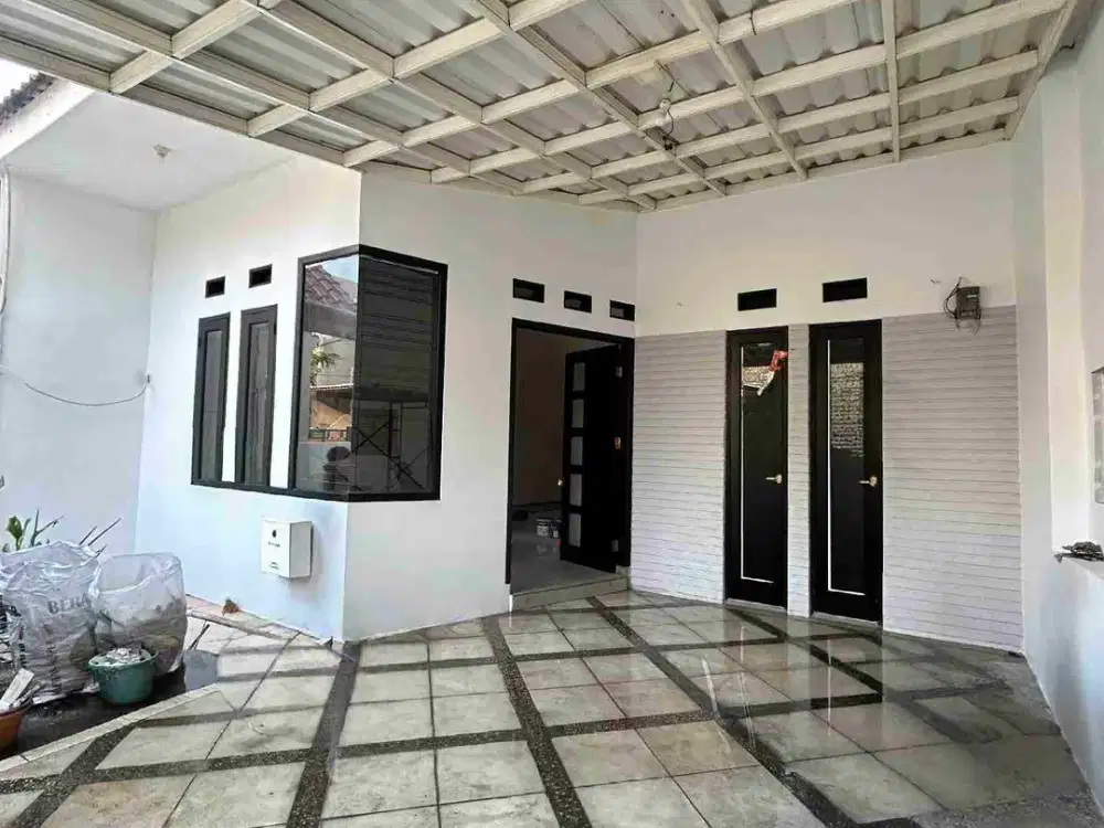 Rumah bangunan baru tingkat LT 112 LB 146 hadap timur di Pekayon bebas banjir