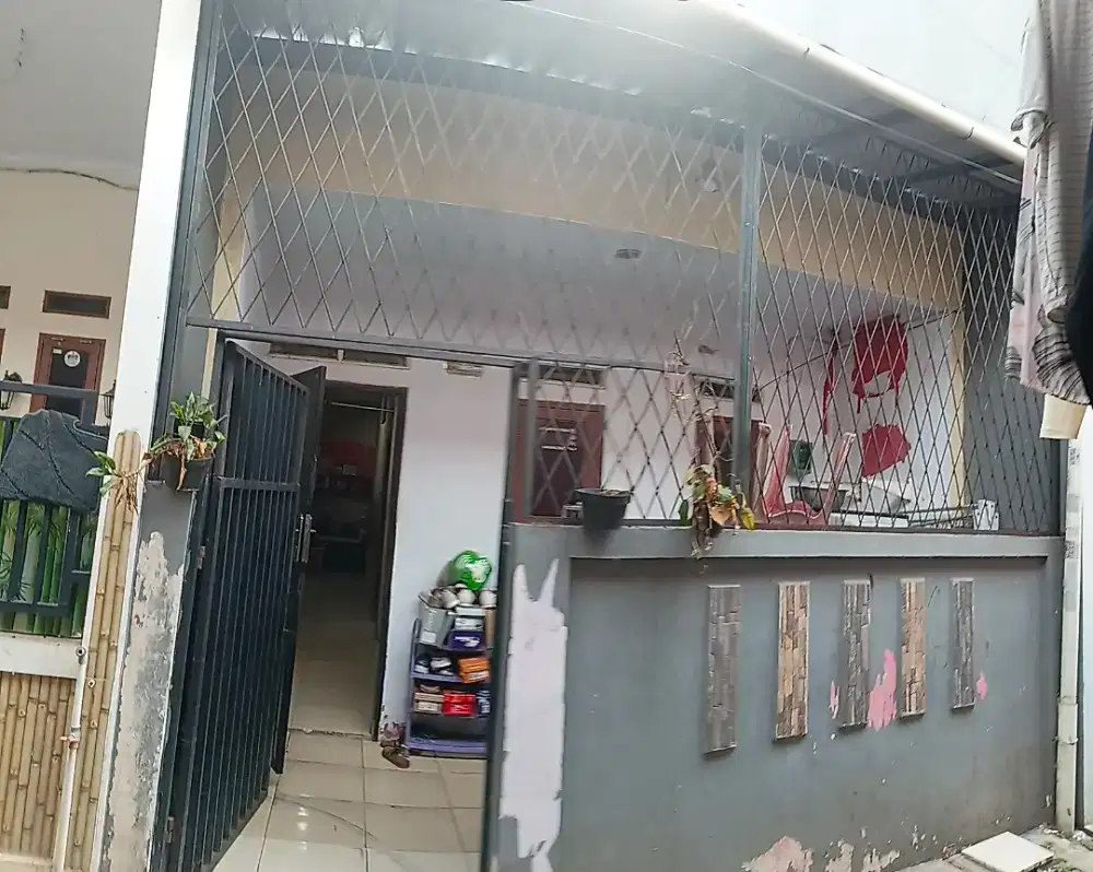 Dijual rumah belakang green lake city