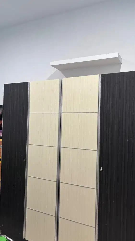 lemari 4 pintu bahan jenis Olympics