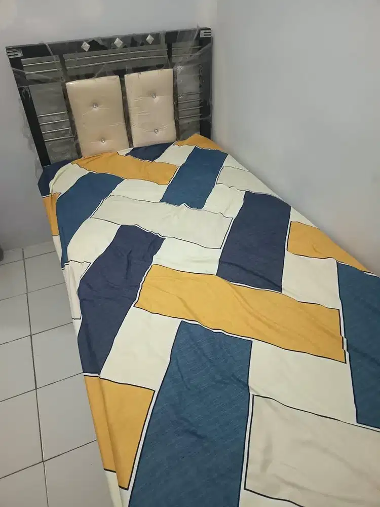 Tempat tidur dan kasur