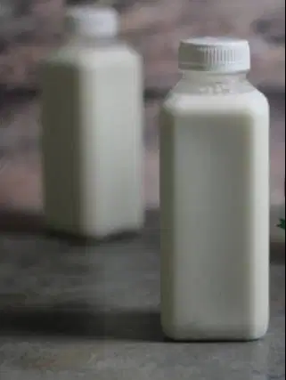 1 liter susu kambing etawa murni kemasan botolan 250ml no campuran top