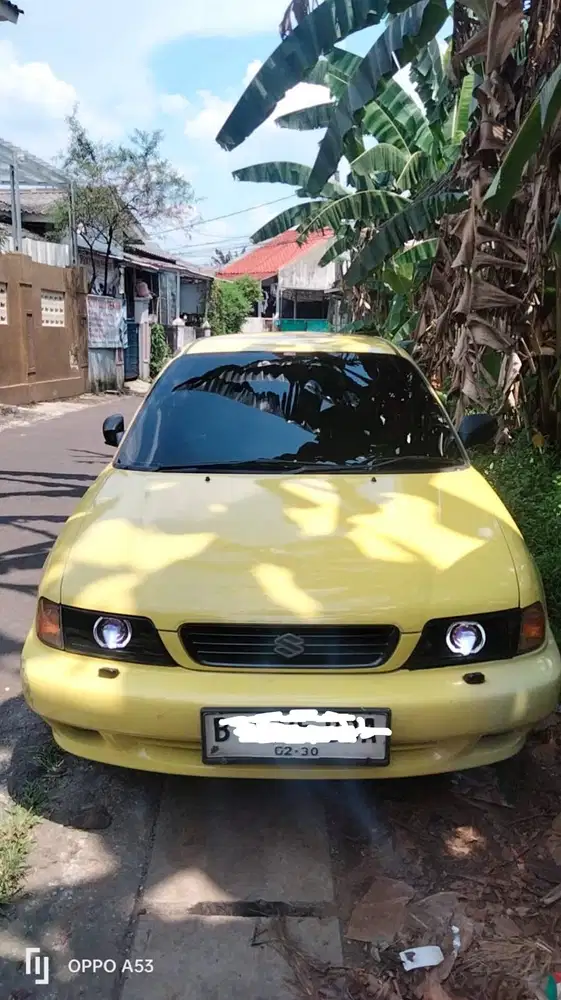 For sale Suzuki Baleno warna kuning