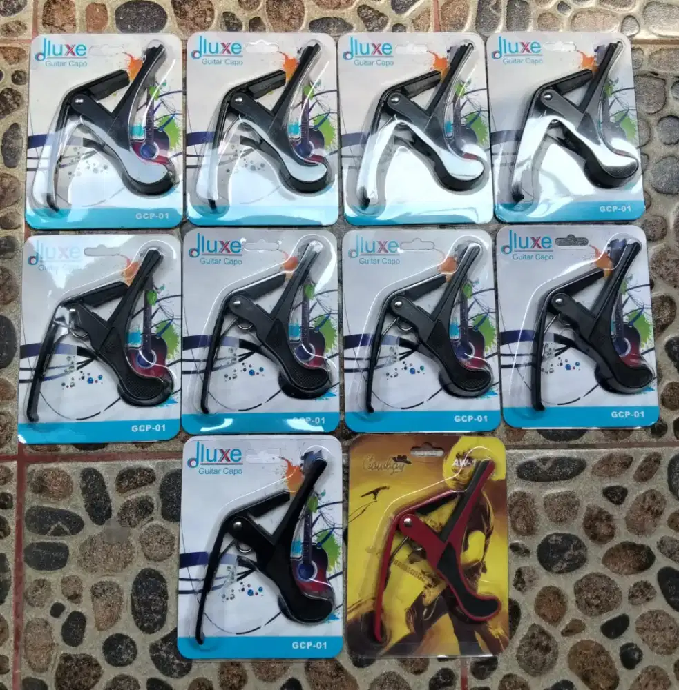 Ready Capo Gitar Merk Dluxe Di Andika Uyeee Music TKP Jatijajar Depok
