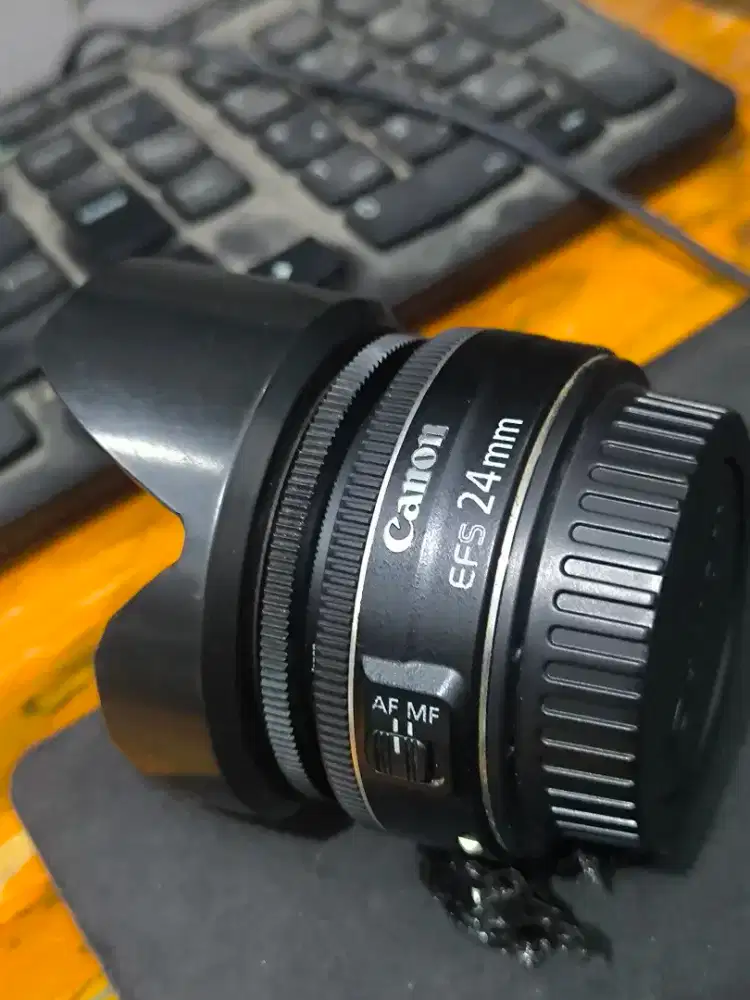 Lensa pancake 24 mm F 2.8 like new