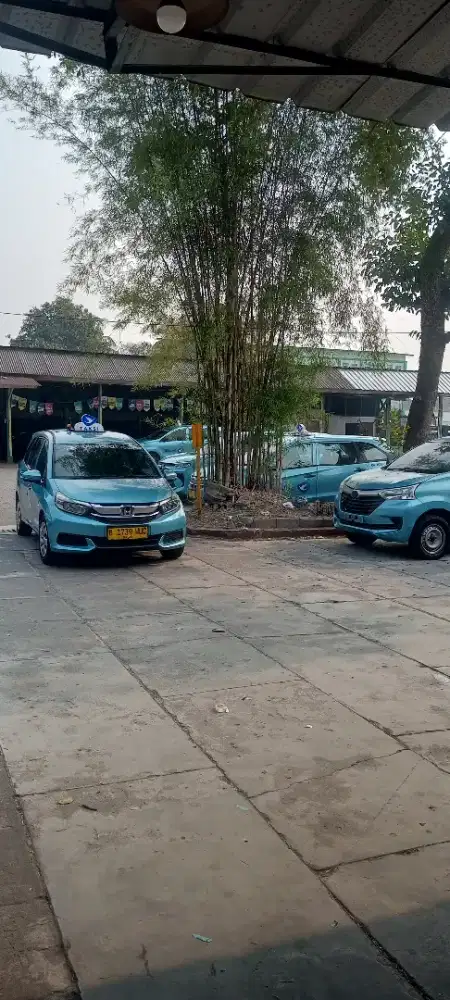 Loker driver taxi Blue Bird