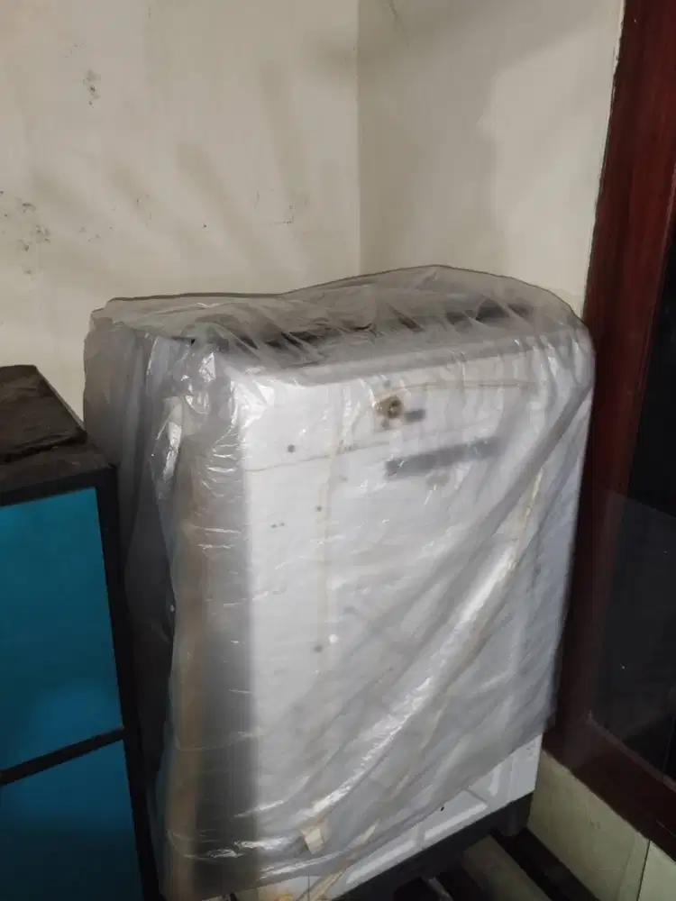 mau di jual aja nih mesin cuci merk TCL kapasitas 8KG