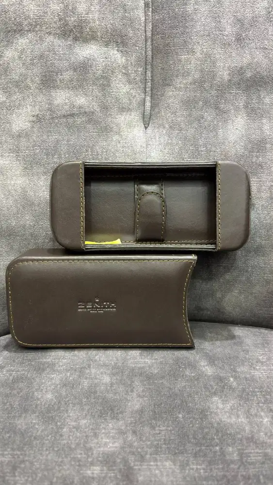 Travel case or box branded with the Zenith Swiss watch logo