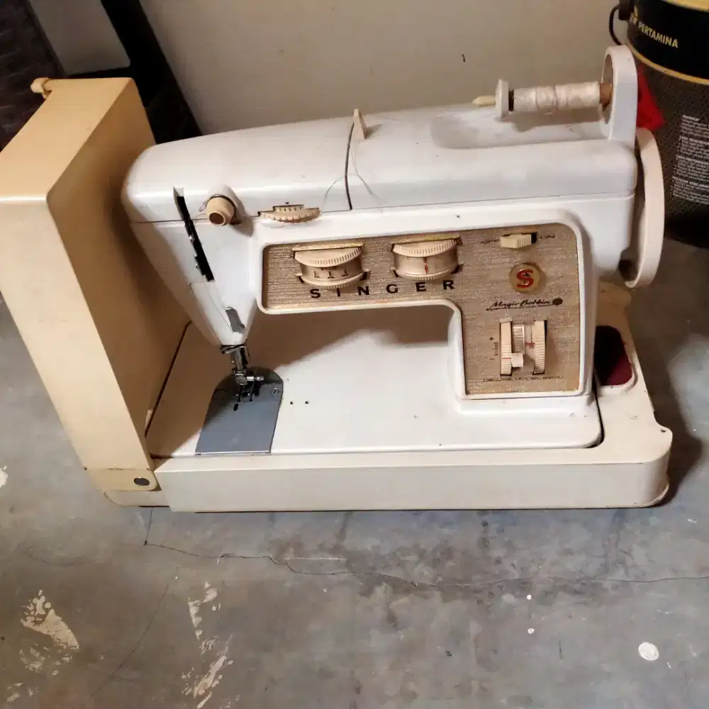 Mesin jahit portable merk singer