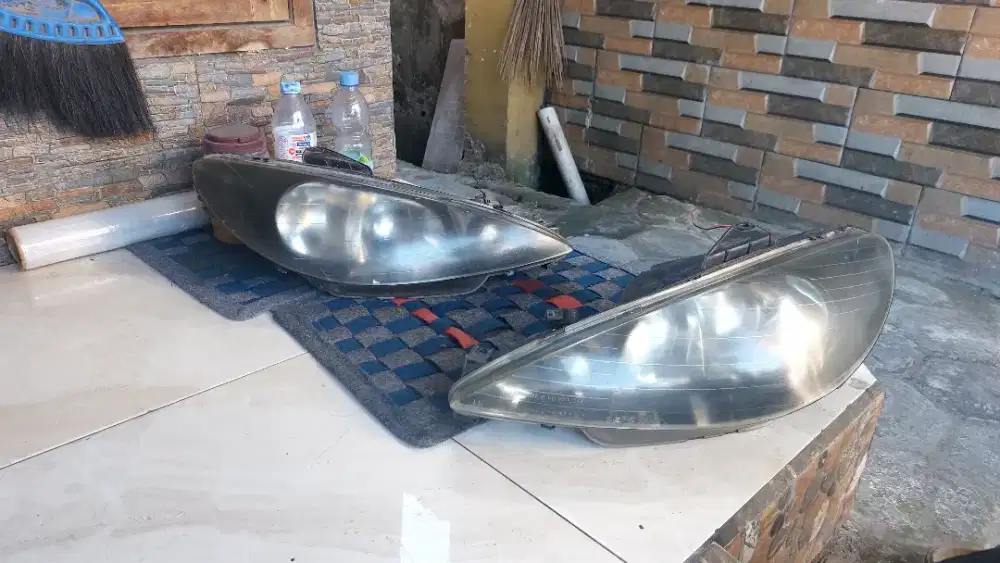 Headlamp peugeot 206 copotan 2004
