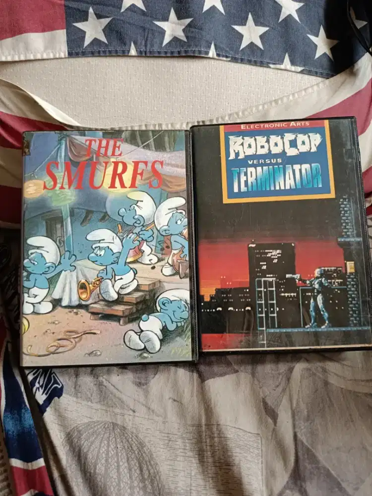 Dijual kaset sega nostalgia The Smurf dan Robocop include box