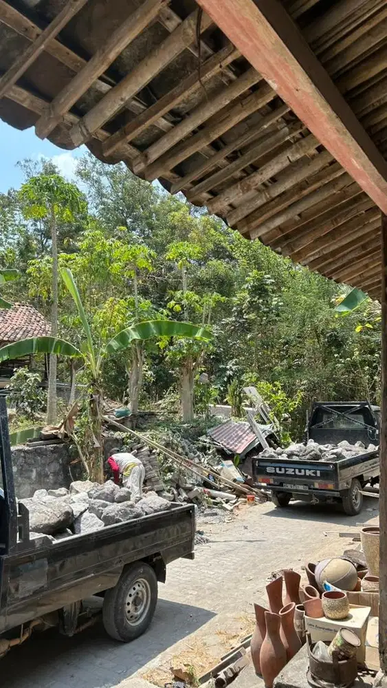 menerima buang puing dan pindahan