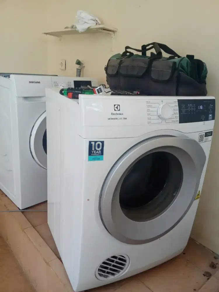 SERVICE MESIN CUCI