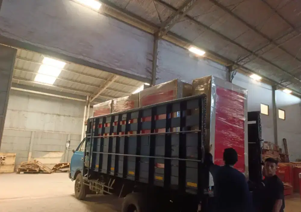 Jasa sewa truck double untuk angkut barang