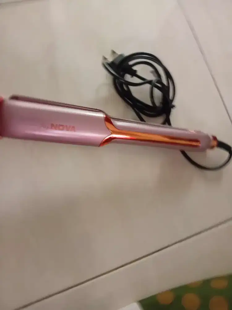 Catokan rambut bisa lurus dan kriting gelombang
