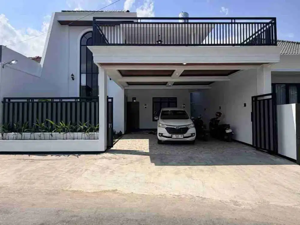 RUMAH BARU MEWAH MODERN 2 LANTAI ISTIMEWA BANGET DENGAN ROOFTOP LUAS DI MAGUWOHARJO DEPOK SLEMAN