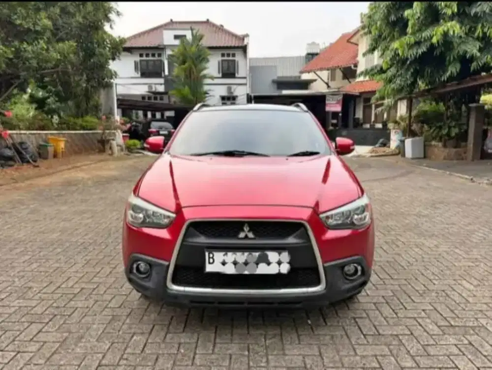 Outlander sport merah muluss
