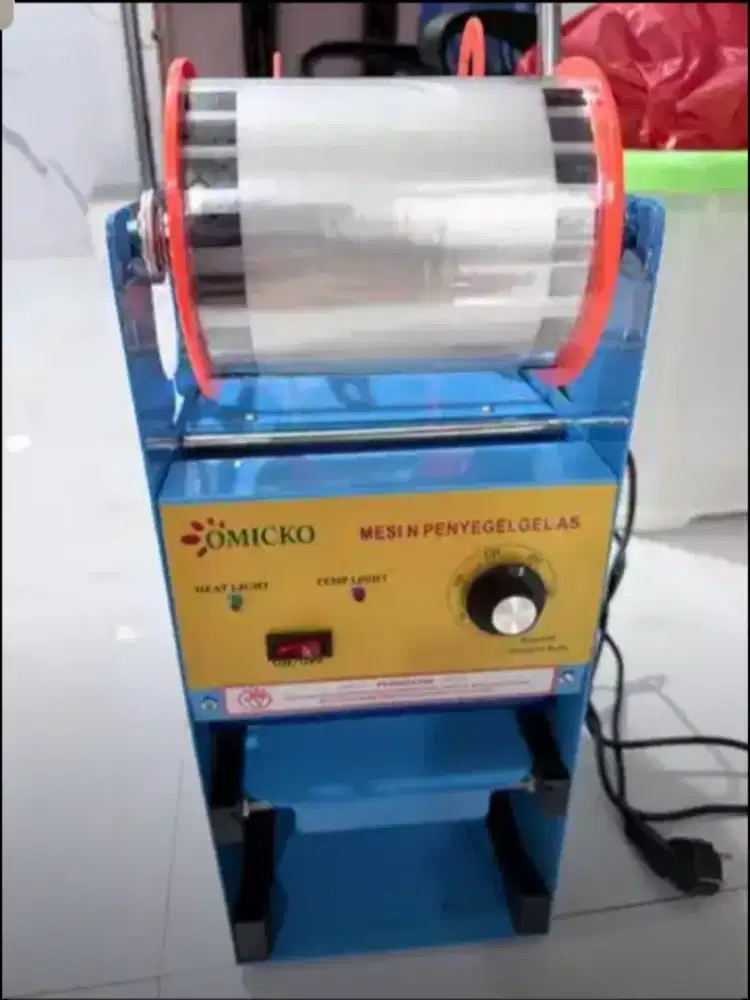 Cup sealer merek omicko