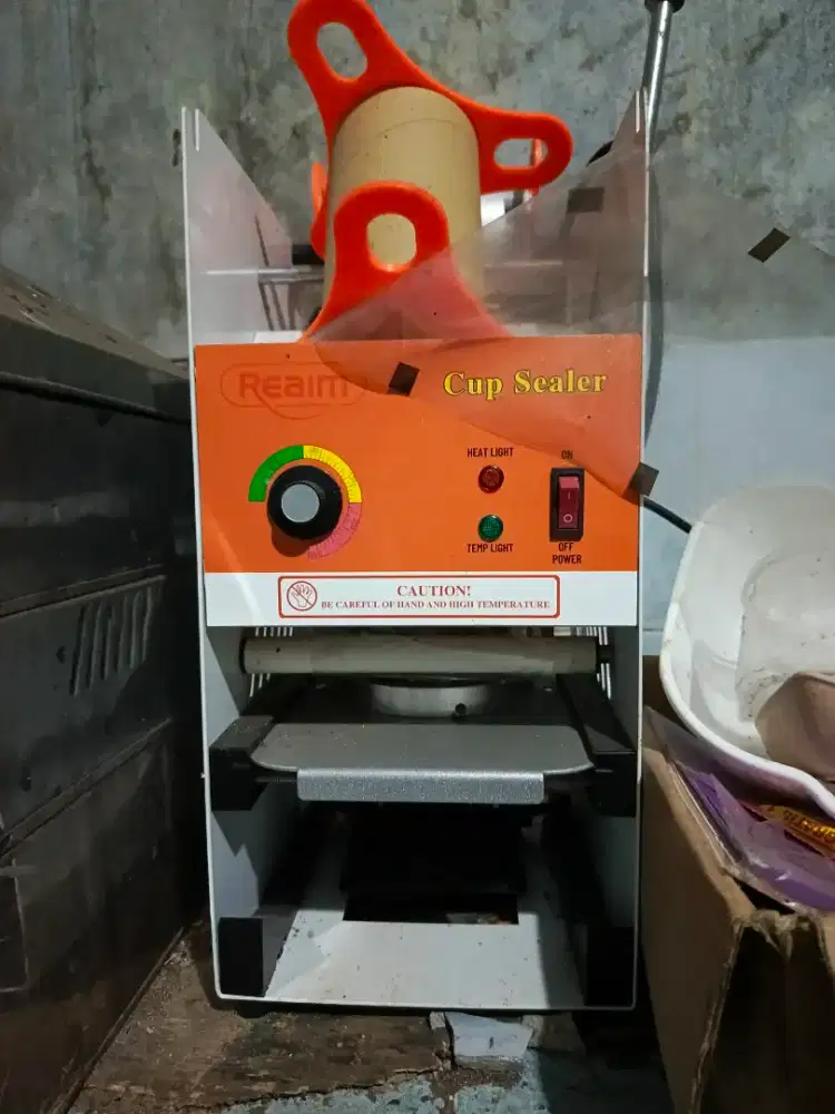 Mesin Cup Sealer Reaim