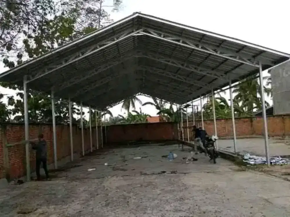 Pemasangan gudang kontruksi bajaringan terpasang