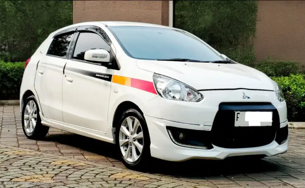 Mitsubishi mirage 1.2 gls sport at white