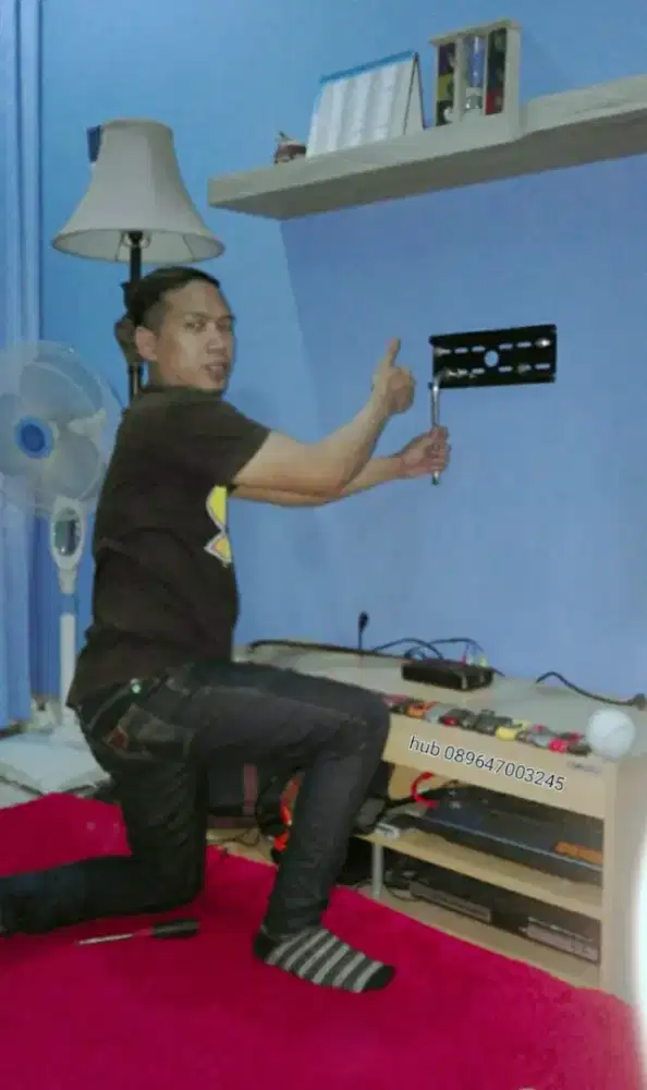 pasang & jual bracket buat gantungan tv led lcd di tembok rapih nyaman
