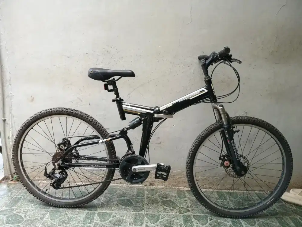 Sepeda lipat 26 fullsus full alloy United. NOS