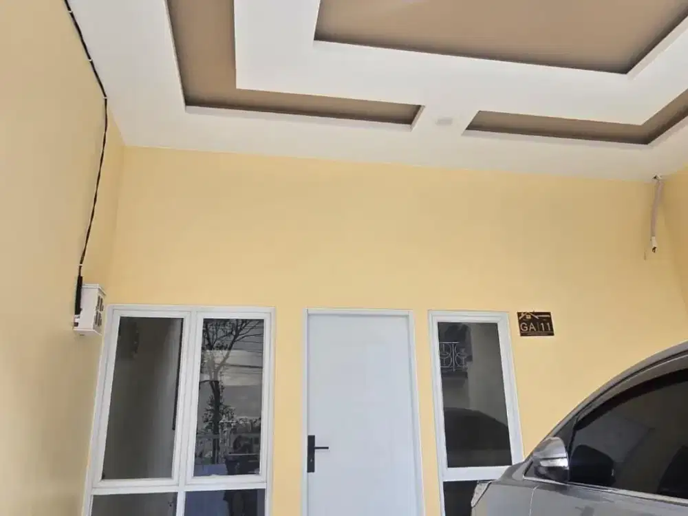 Rumah Baru Harapan Indah Finishing Granit dan Balkon Kaca Temper
