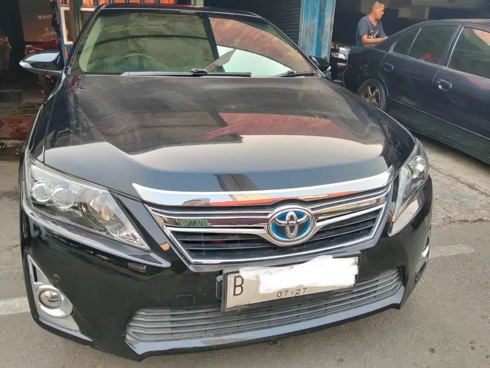 Dijual toyota camry 2012 an PT, hitam km 150rb