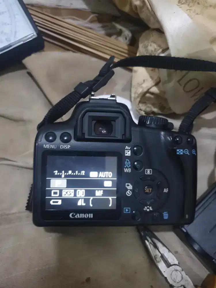 Camera canon 1000d Body, +charger+tas