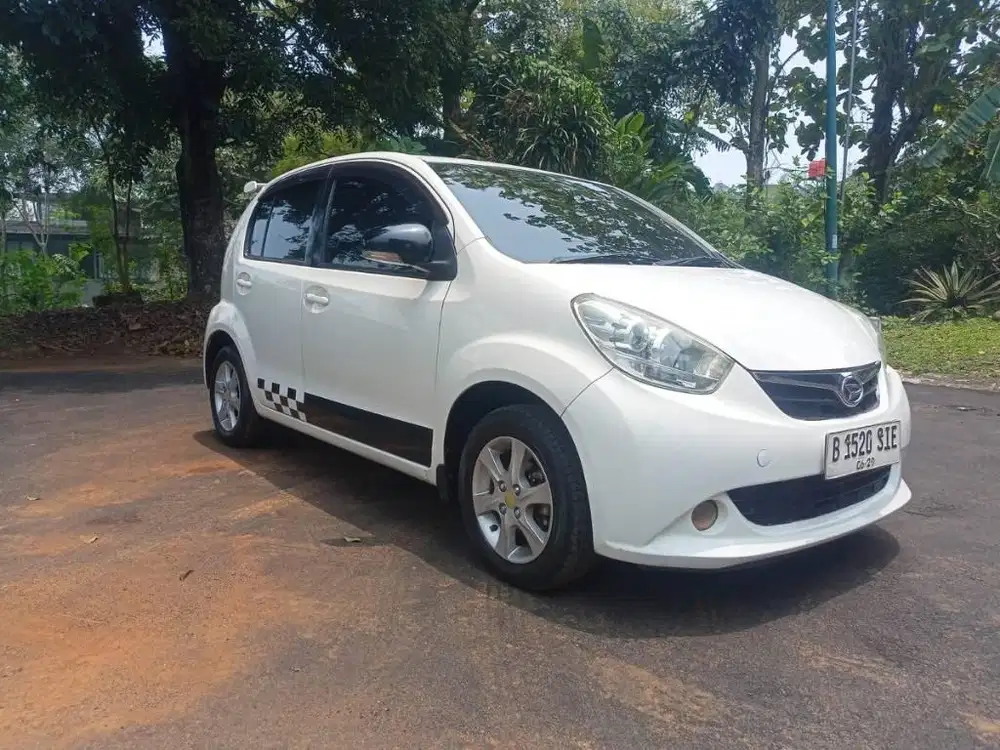 DAIHATSU SIRION RS M/T 2014 CASH 83.5 jt NEGO