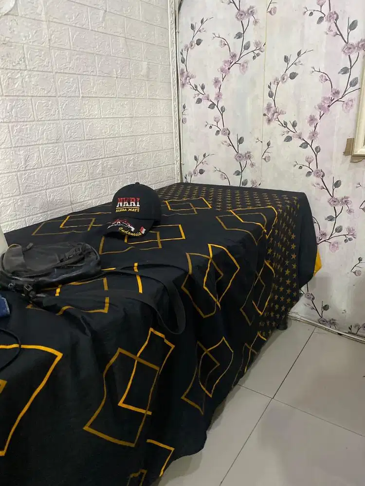 Penjaga kos kosan
