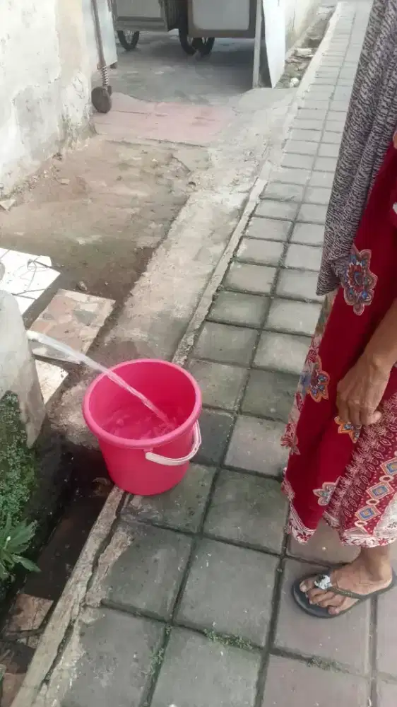 Tukang bangunan harian dan borongan
