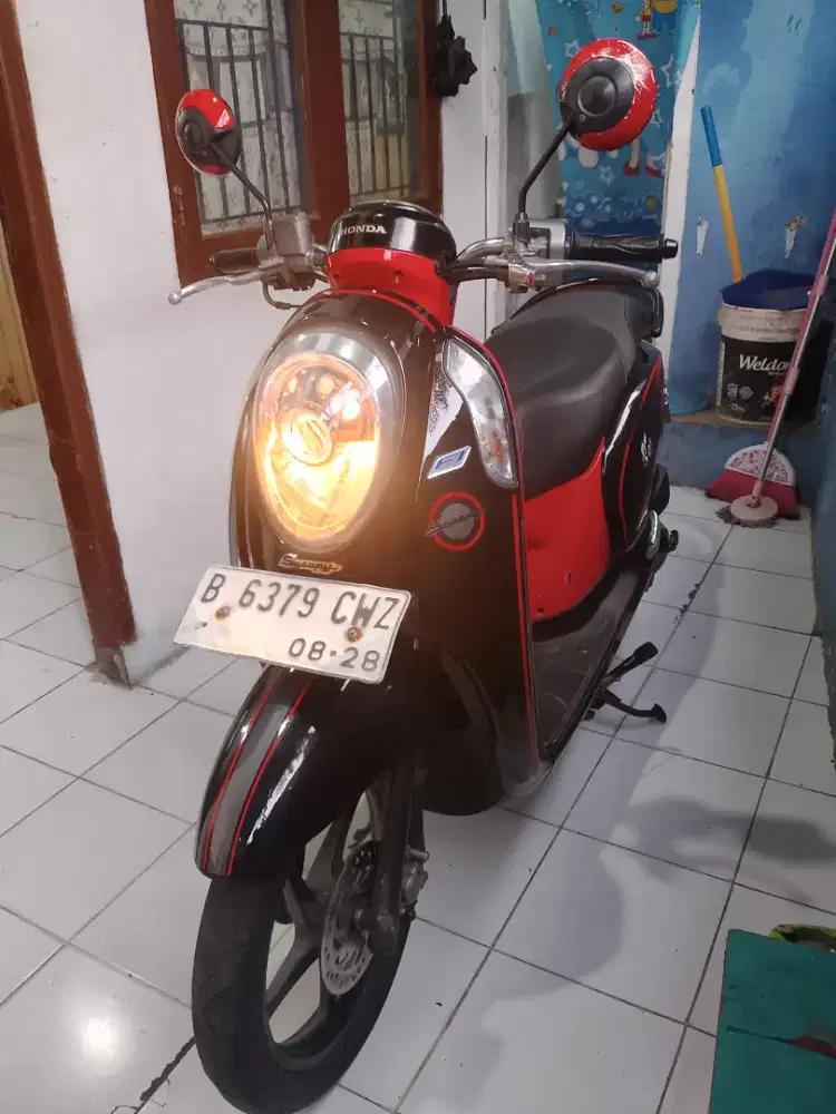 Scoopy fi injeksien th 2013