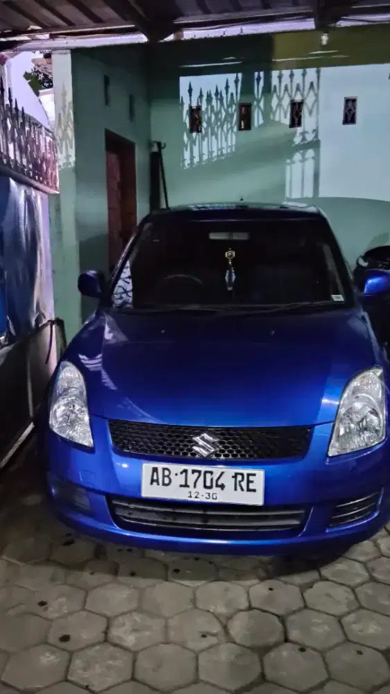 SWIFT 2010 TANGAN PERTAMA BEKAS DOSEN
