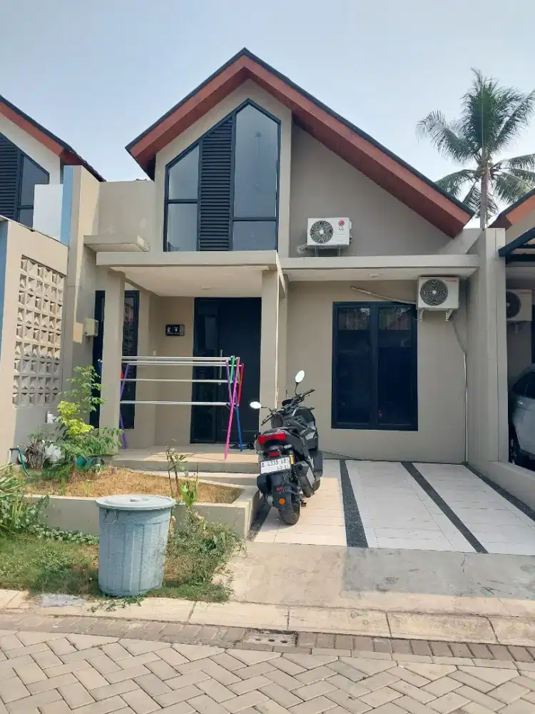 Over kredit rumah
