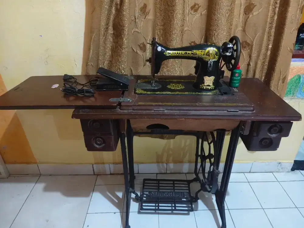 Mending jahit merek buterfly