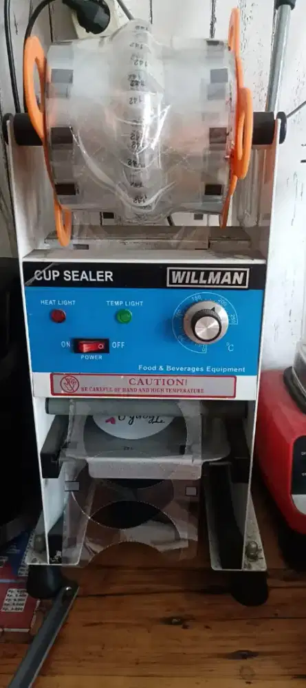 Cup sealer Willman