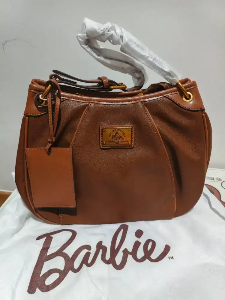 Tas baru import