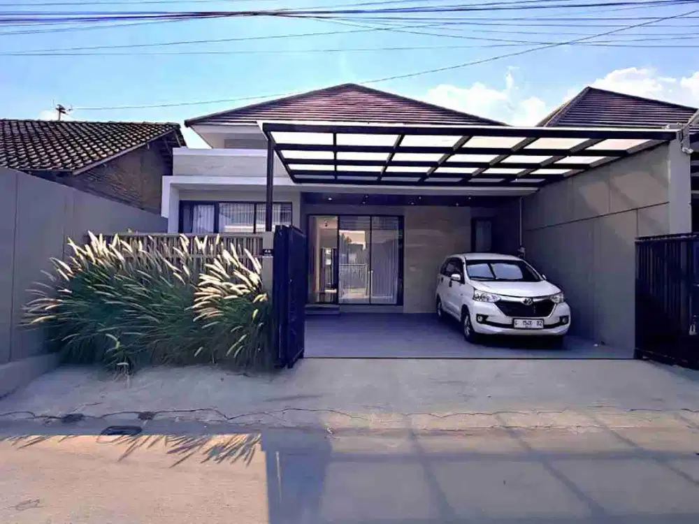 RUMAH MODERN KEKINIAN OPEN SPACE DENGAN TANAH LUAS DI PURWOMARTANI KALASAN SLEMAN