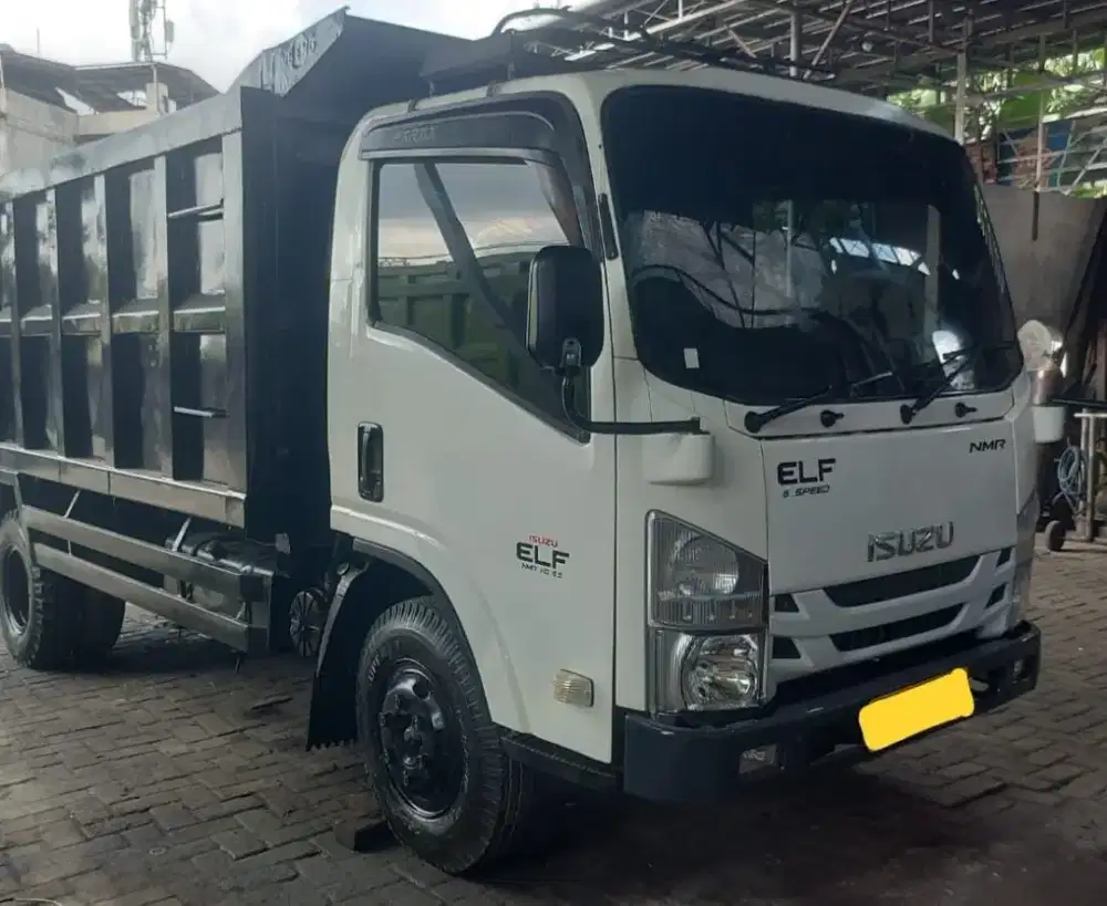 Isuzu ELF NMR Dump Truk
