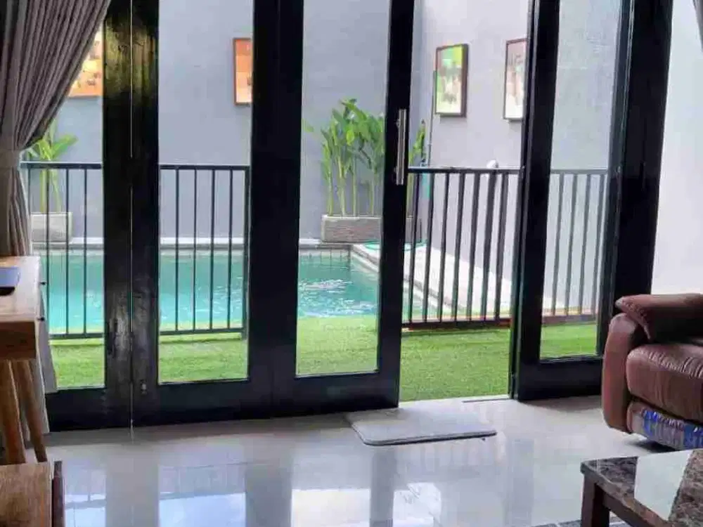 Rumah Style Villa Full Furnished dengan Kolam Renang di Padangsambian