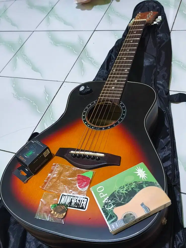 Gitar akustik elektrik jeselin