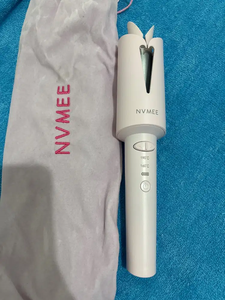 Catokan curly portable nvmee