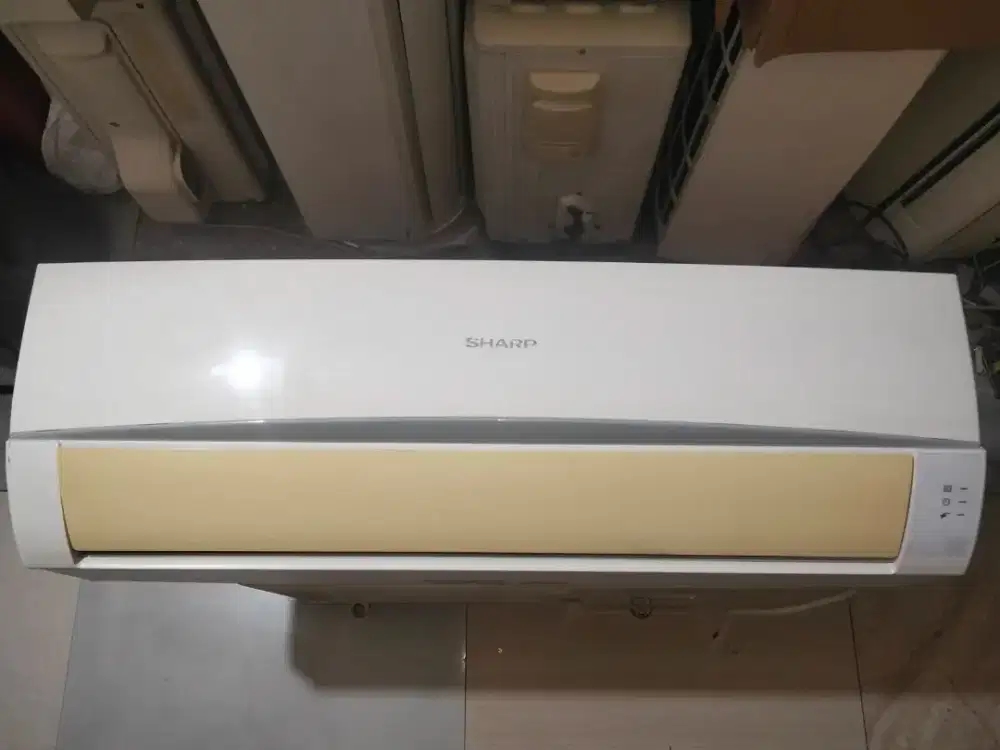 Indor ac setengah pk sharp R22