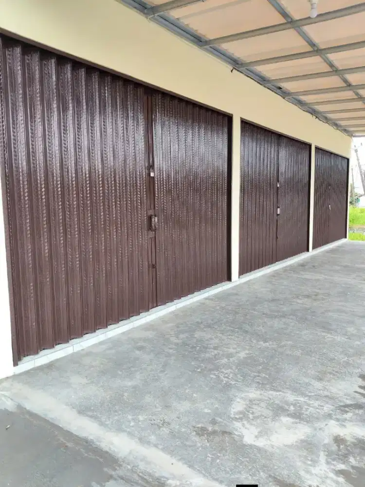 Folding gate rolling door