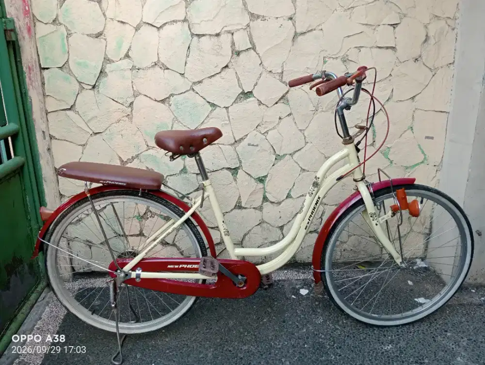 Jual butuh sepeda mini New Phoenix UK 26 minus ban belakang bocor