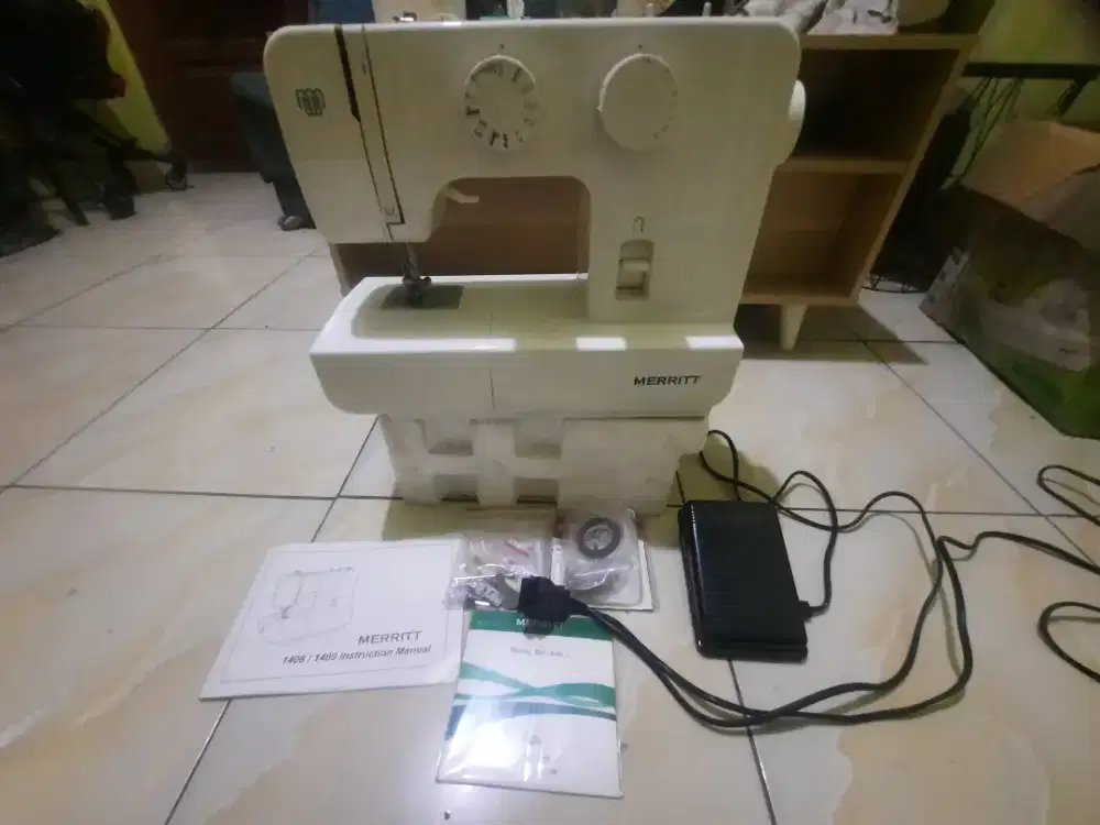 Meisn jahit portable