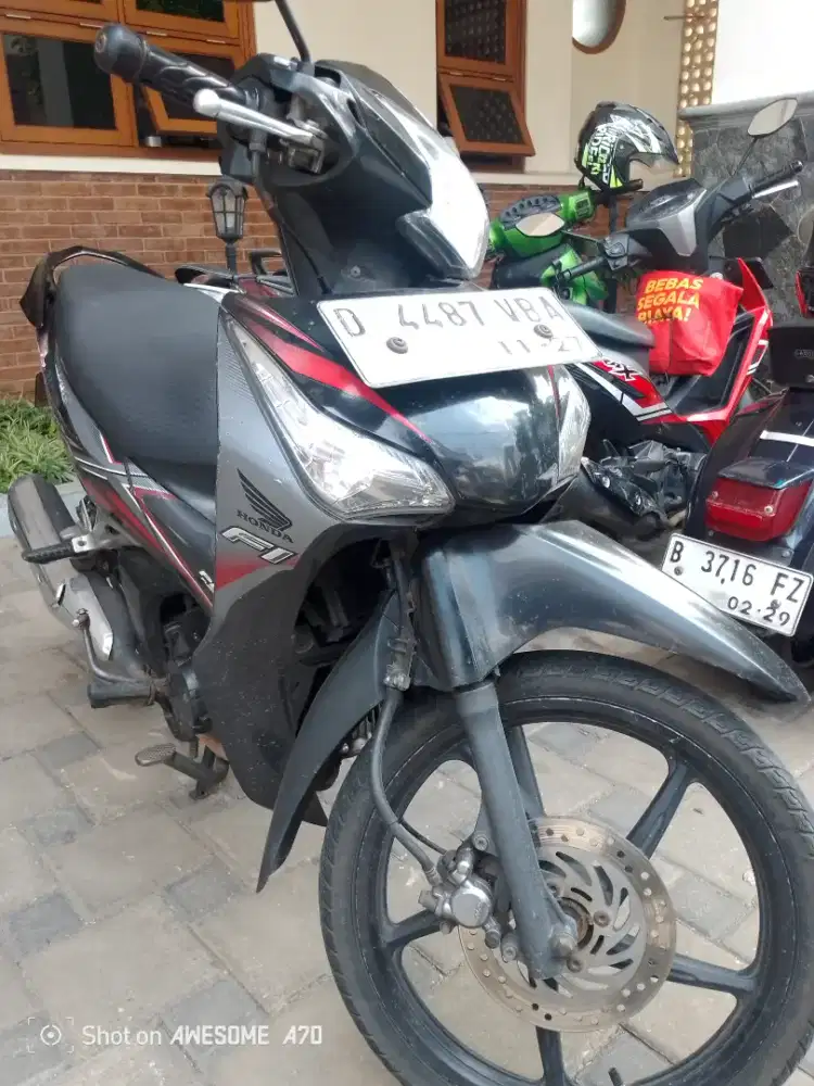Honda Supra X125 Helm in double disk 2012