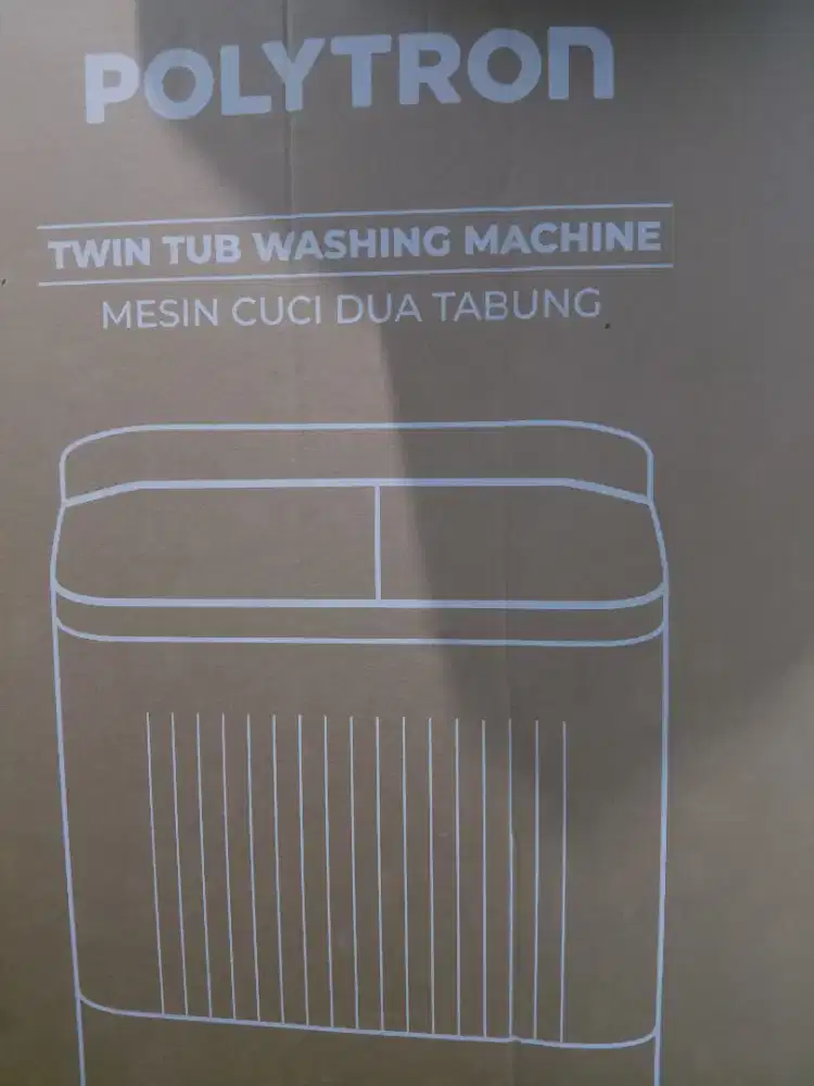 mesin cuci bekas terlihat baru